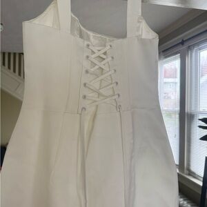 PrettyLittleThing Cream Lace-Up Mini Dress